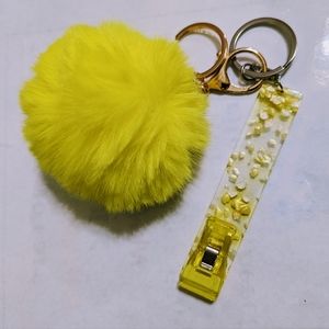 Pom pom with card holder